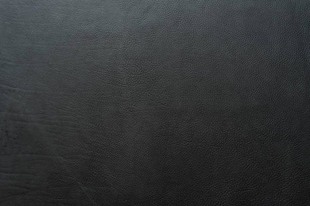istock Black color grainy, heavy grain calf cow leather texture and background. 1035072858