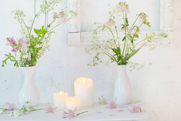 istock white vintage interior with flowers and candles 1035073790