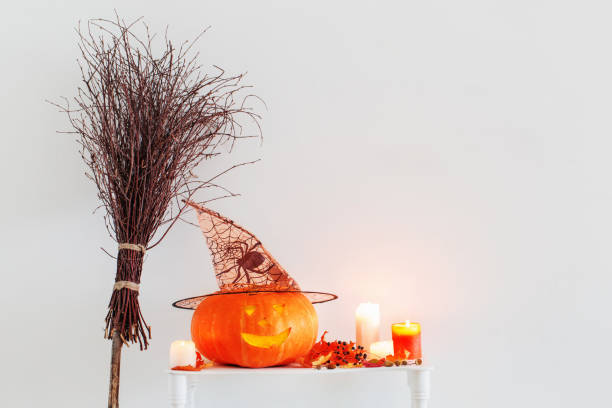 istock Halloween decorations on  wooden shelf 1035077920