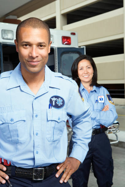 istock African male paramedic with co-worker in background 1035099632