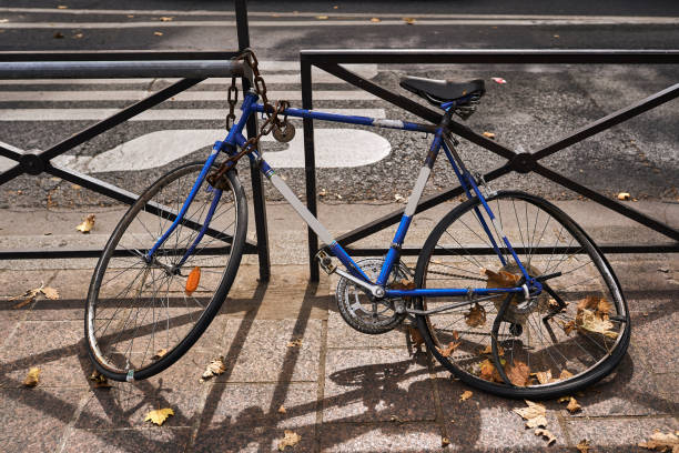 istock Old bicycle parked in the street 1035102128
