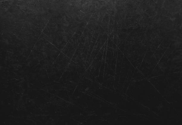istock Old dark brown wooden background with scratches. Table texture. 1035103842