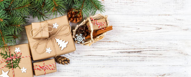 istock Christmas still life with gift box and gift box. Festive decoration. Christmas tree branches with basket 1035106436