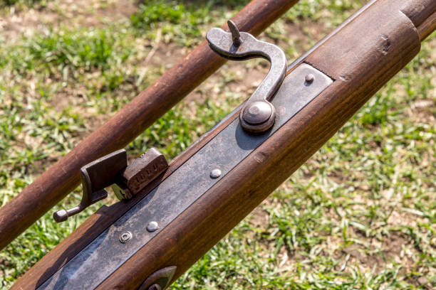 Old english rifle - vintage guns Old english rifle - vintage guns - Medieval Festival Durham United Kingdom rifle old fashioned antique ancient stock pictures, royalty-free photos & images