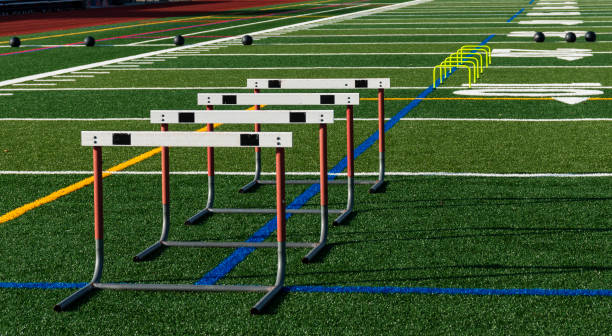 istock Hurdles and medicine balls set up for speed and agility training 1035108174