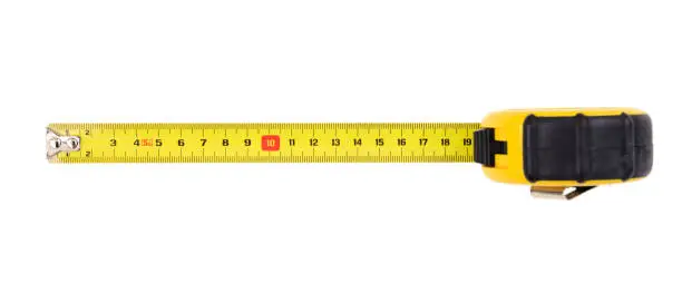 Photo of Measuring tape isolated on white background, top view