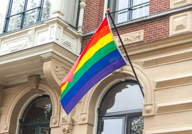 istock The rainbow pride LGBT flag blows in the wind 1035111820