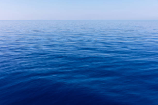 Mediterranean sea. Blue sky and calm sea water texture background, view from the ship