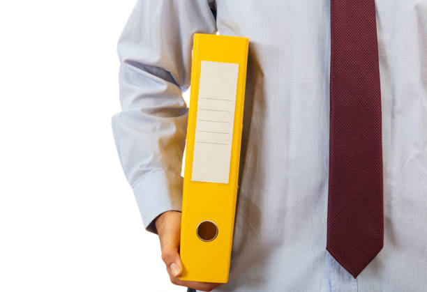 Business filling work. Manager holding a binder folder with blank label on white background, clipping path