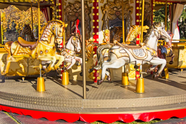 istock Old fashioned french carousel with horses 1035123798