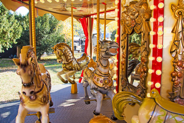 istock Old fashioned french carousel with horses 1035123858