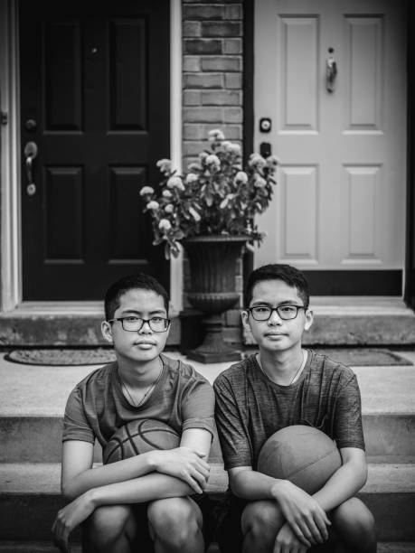 istock Twins at basketball 1035126916