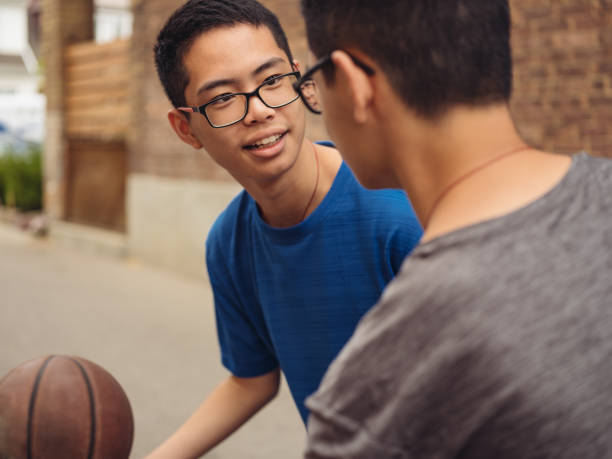 istock Twins at basketball 1035127186