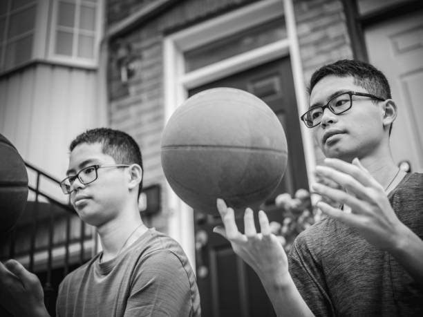 istock Twins at basketball 1035127352