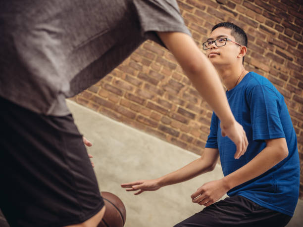 istock Twins at basketball 1035127494