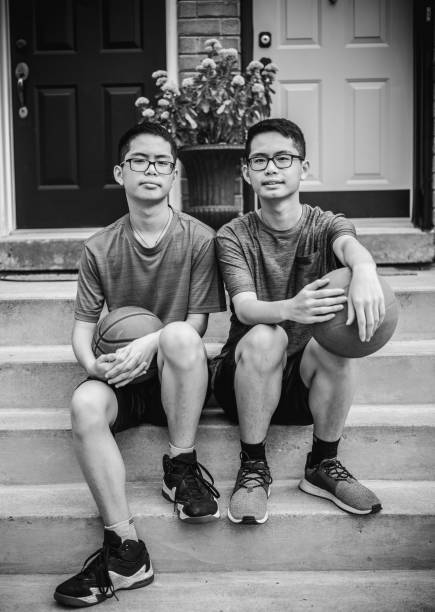 istock Twins at basketball 1035127886