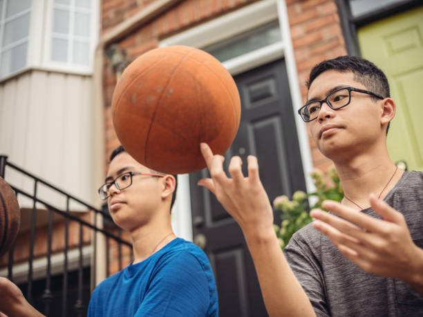 istock Twins at basketball 1035127958