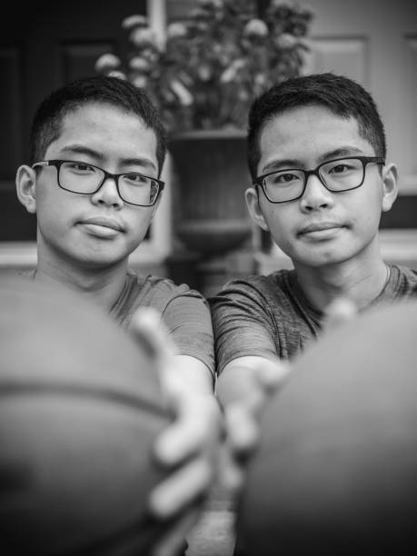 istock Twins at basketball 1035130222