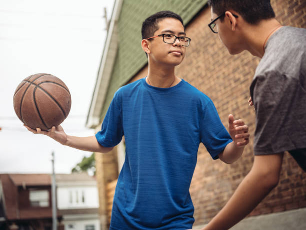 istock Twins at basketball 1035130378