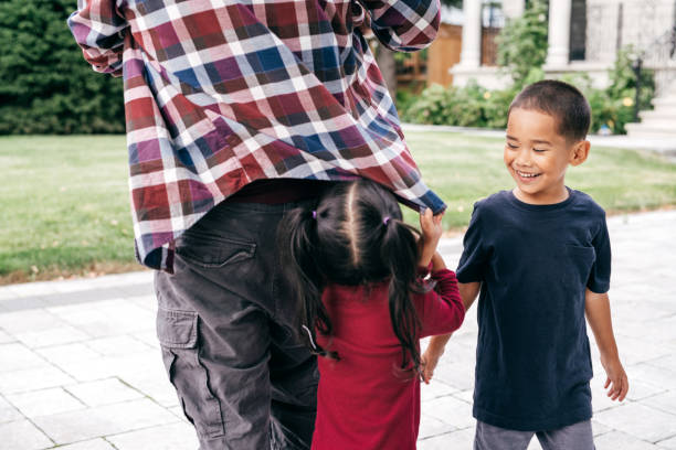 istock Having fun with dad and little sister 1035146256