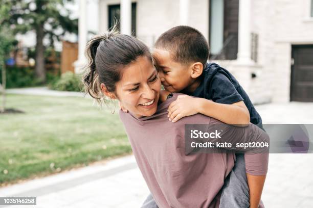 Mom And Son Having Fun Outdoor Stock Photo - Download Image Now - Child, Family, Mother