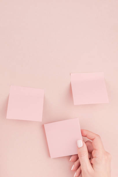 istock Woman hands with paper stickers 1035146534