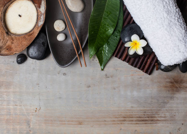 istock spa tropical objects ready for wellness healthy therapy on wooden background. 1035154096