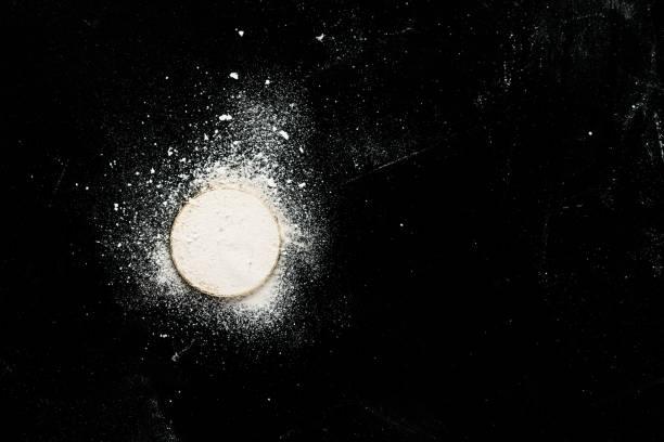 istock Gold bitcoin sprinkled with cocaine on a black table 1035154118