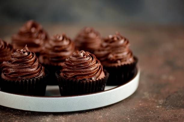 istock Delicious homemade chocolate capkakes. 1035158330