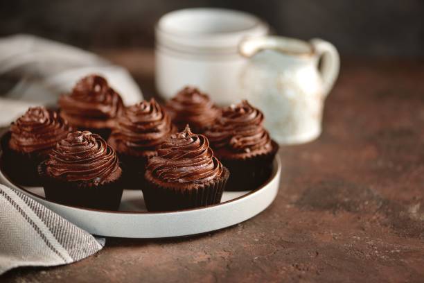 istock Delicious homemade chocolate capkakes. 1035158526