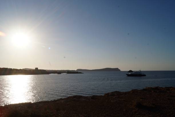 istock sunset in the sea. ibiza 1035159112