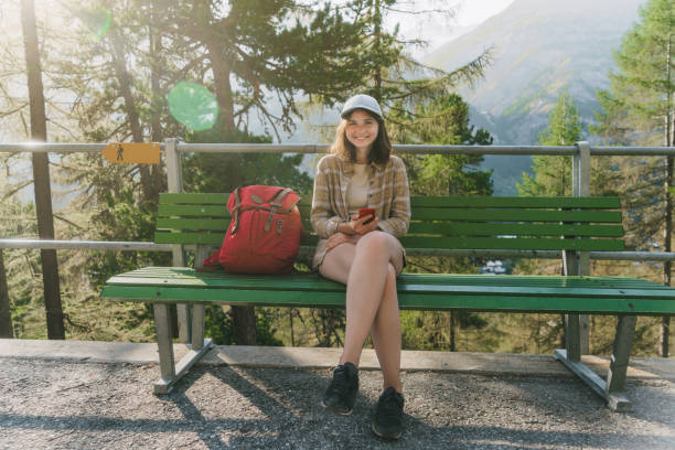 istock Woman waiting  for Gornergrat train on the train station 1035161470