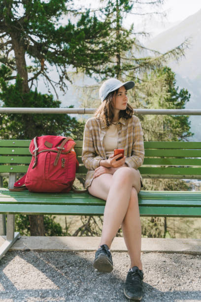 istock Woman waiting  for Gornergrat train on the train station 1035161648