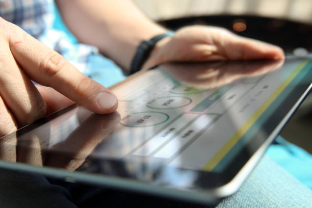 istock Truck driver working with electronic logbook 1035165482