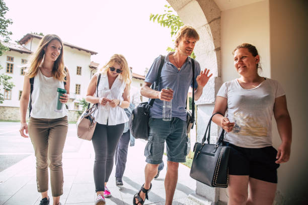 istock A Group Of Mature Students Taking A Break Together 1035165798