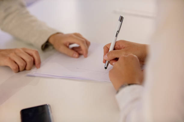 istock Writing on business meeting 1035166164