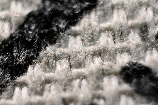 An extreme close-up of synthetic fiber woven texture.
