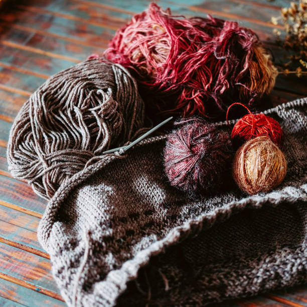 istock Favorite winter pass time. Knitting a warm stranded sweater. 1035169302