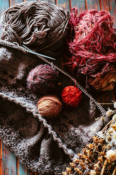 istock Favorite winter pass time. Knitting a warm stranded sweater. 1035169320