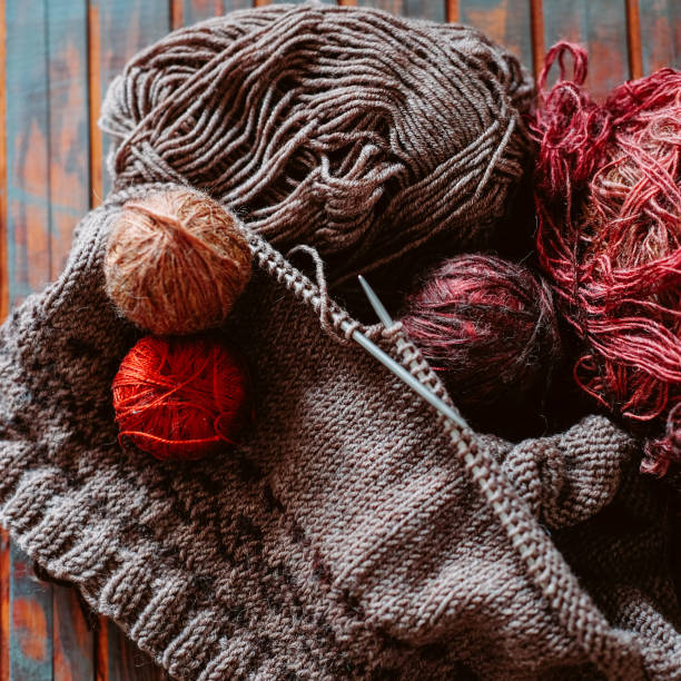istock Favorite winter pass time. Knitting a warm stranded sweater. 1035169352