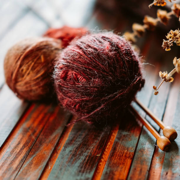 istock Favorite winter pass time. Knitting a sample of warm stranded sweater. 1035169394