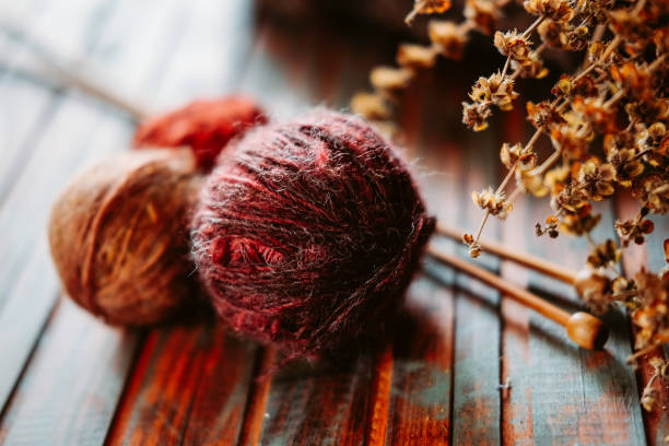 istock Favorite winter pass time. Knitting a sample of warm stranded sweater. 1035169408
