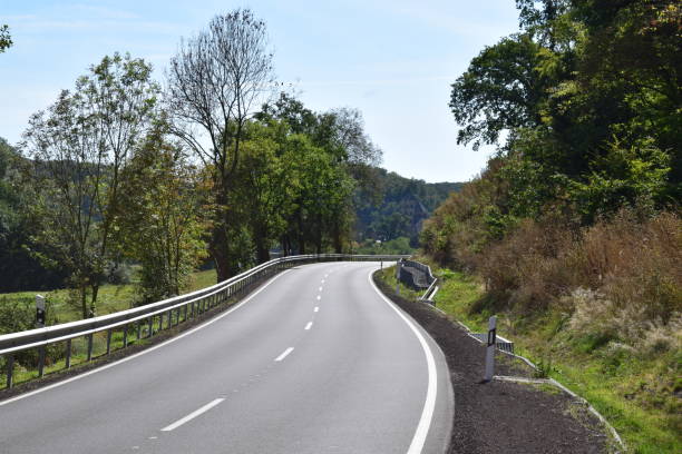 istock river side road at Laacher See 1035176220