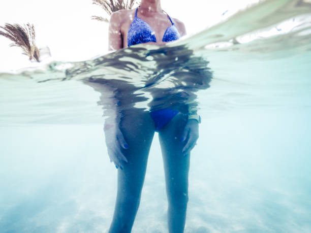 istock Woman In Swimming Pool 1035181116
