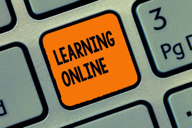 istock Handwriting text writing Learning Online. Concept meaning Learn something new with the help of internet and technology 1035188900