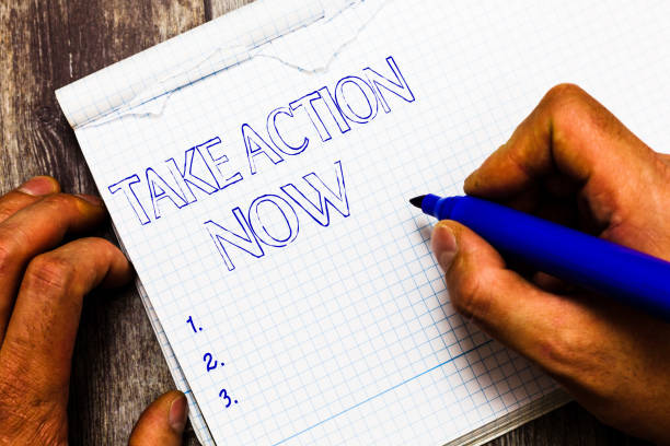 istock Handwriting text writing Take Action Now. Concept meaning asking someone to start doing Good performance Encourage 1035193932