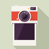 istock Photo Camera with Empty polaroid photo frame 1035204890
