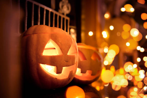istock Halloween Pumpkins with sparkling lights 1035211022