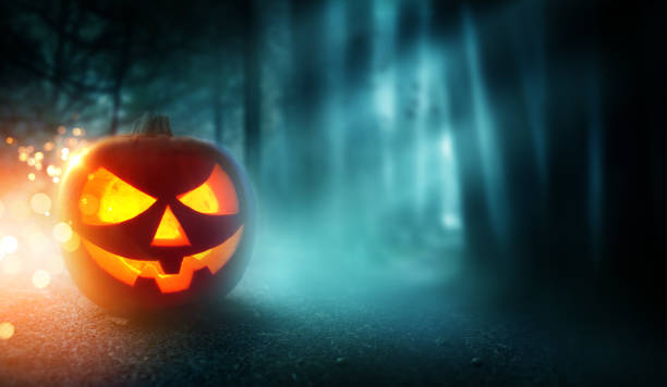 istock Spooky Halloween Background and Jack O Lantern 1035212024