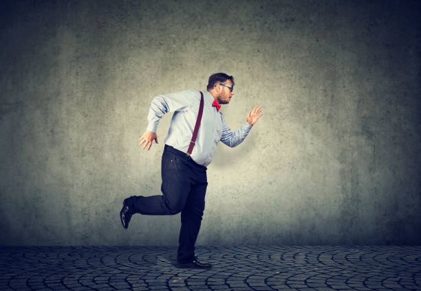 istock Chunky busy man running fast 1035213602